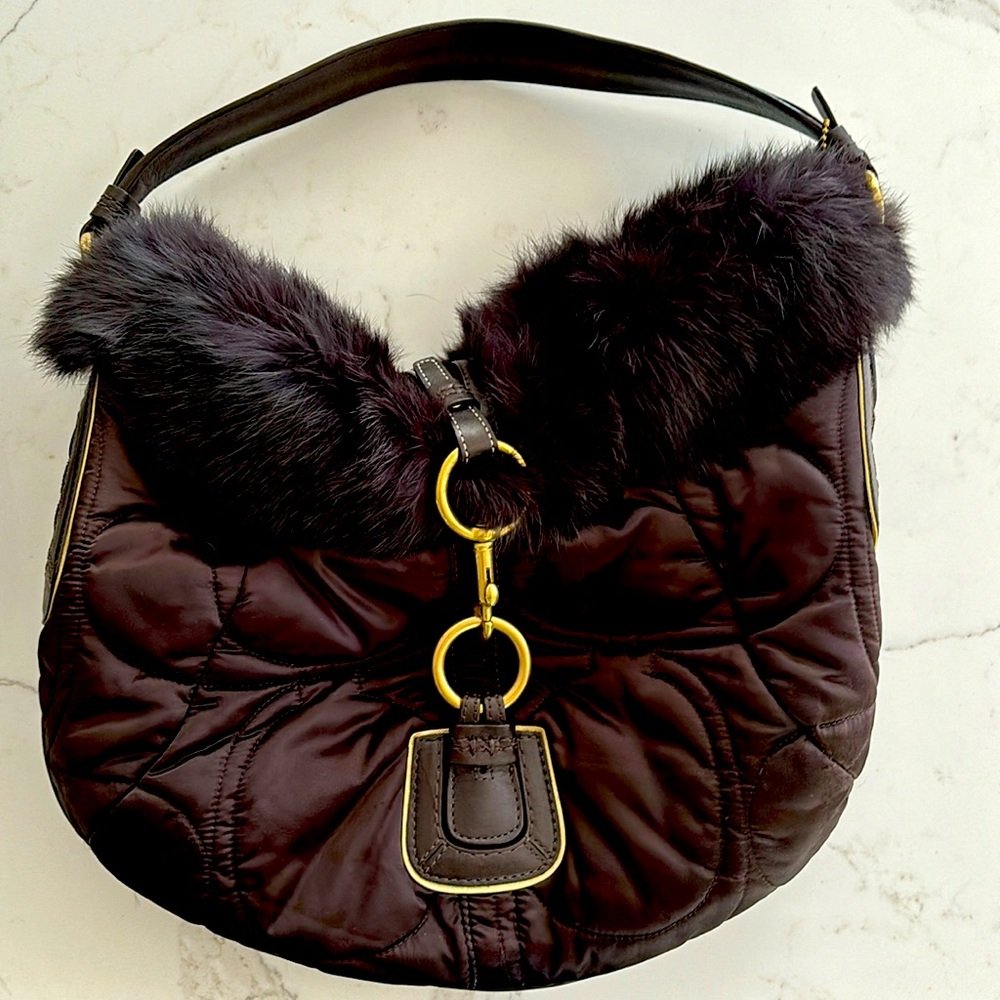 Coach purse with fur trim, and signature buckle